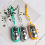 Calm Carry device available in Yellow, Grey, and Aqua colors.
